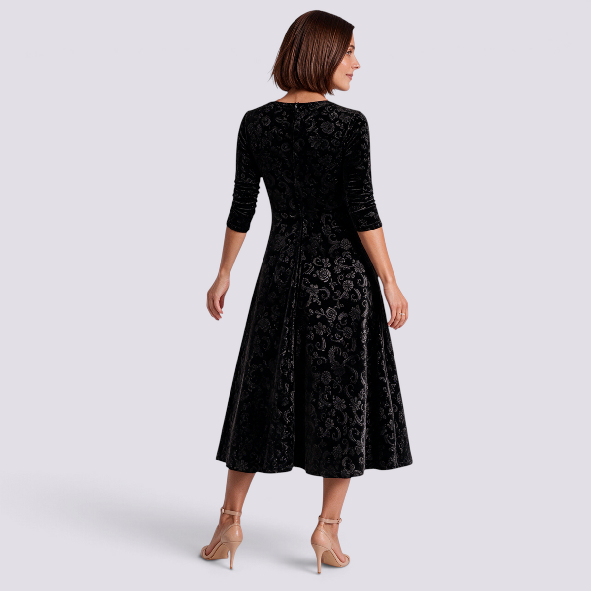 Essyro black velvet midi dress with floral jacquard pattern, square neckline, long sleeves, and A-line skirt