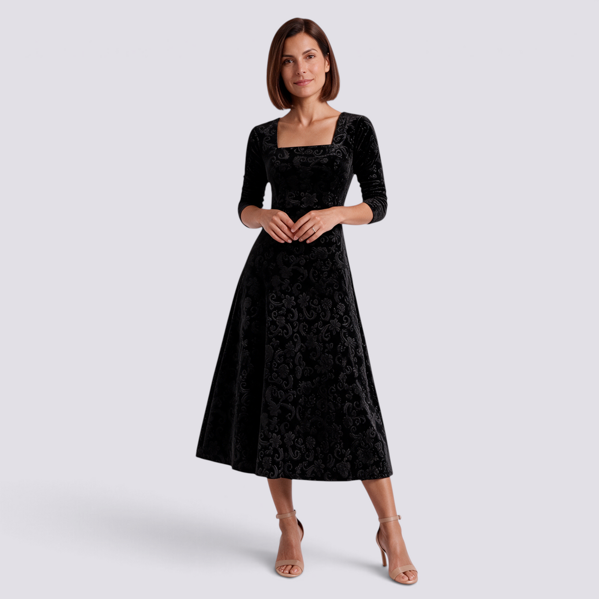 Essyro black midi velvet dress with floral jacquard pattern, square neckline, and A-line skirt worn by a model.