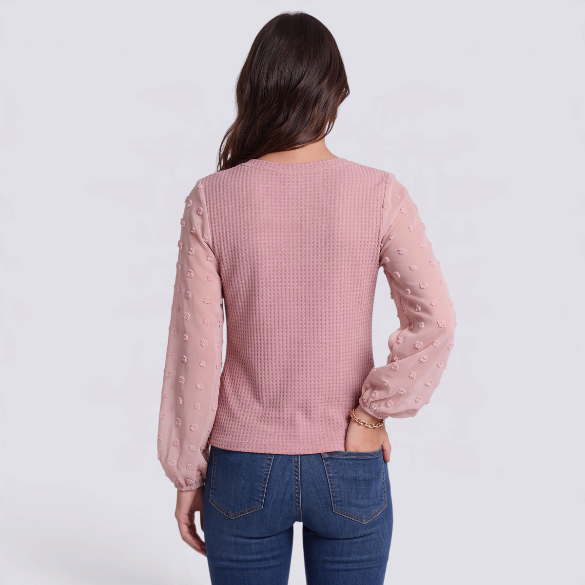 Blusa mujer rosa de punto waffle con mangas de plumeti, espalda lisa, vista trasera