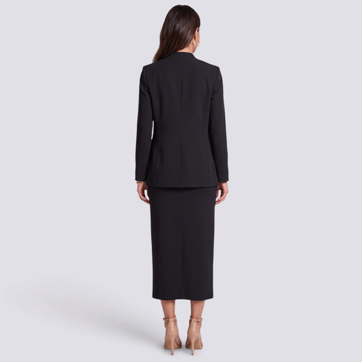 Conjunto mujer blazer chaleco y falda midi negro, vista trasera
