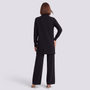 Conjunto jersey largo y pantalón ancho mujer en negro, vista trasera