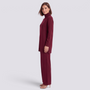 Conjunto jersey largo y pantalón ancho mujer en burdeos, vista lateral