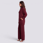 Conjunto mujer jersey cruzado con botones dorados, Burdeos, vista lateral