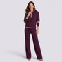 Conjunto mujer media cremallera y pantalón ancho púrpura, vista frontal