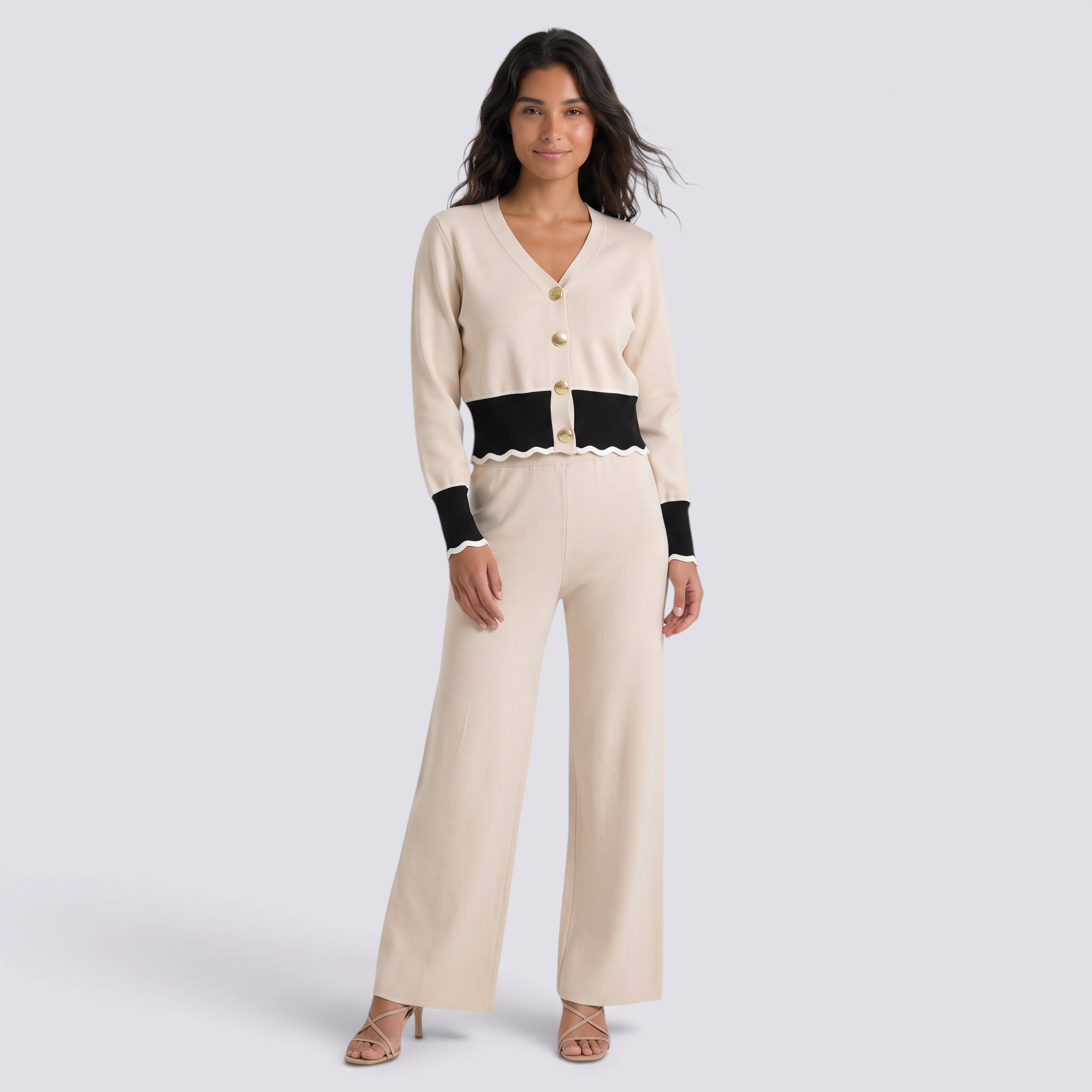 Conjunto punto mujer cárdigan bicolor y pantalón ancho en color beige con detalles negros, vista frontal