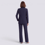 Conjunto traje mujer de tres piezas en azul marino con blazer y pantalón ancho, vista trasera