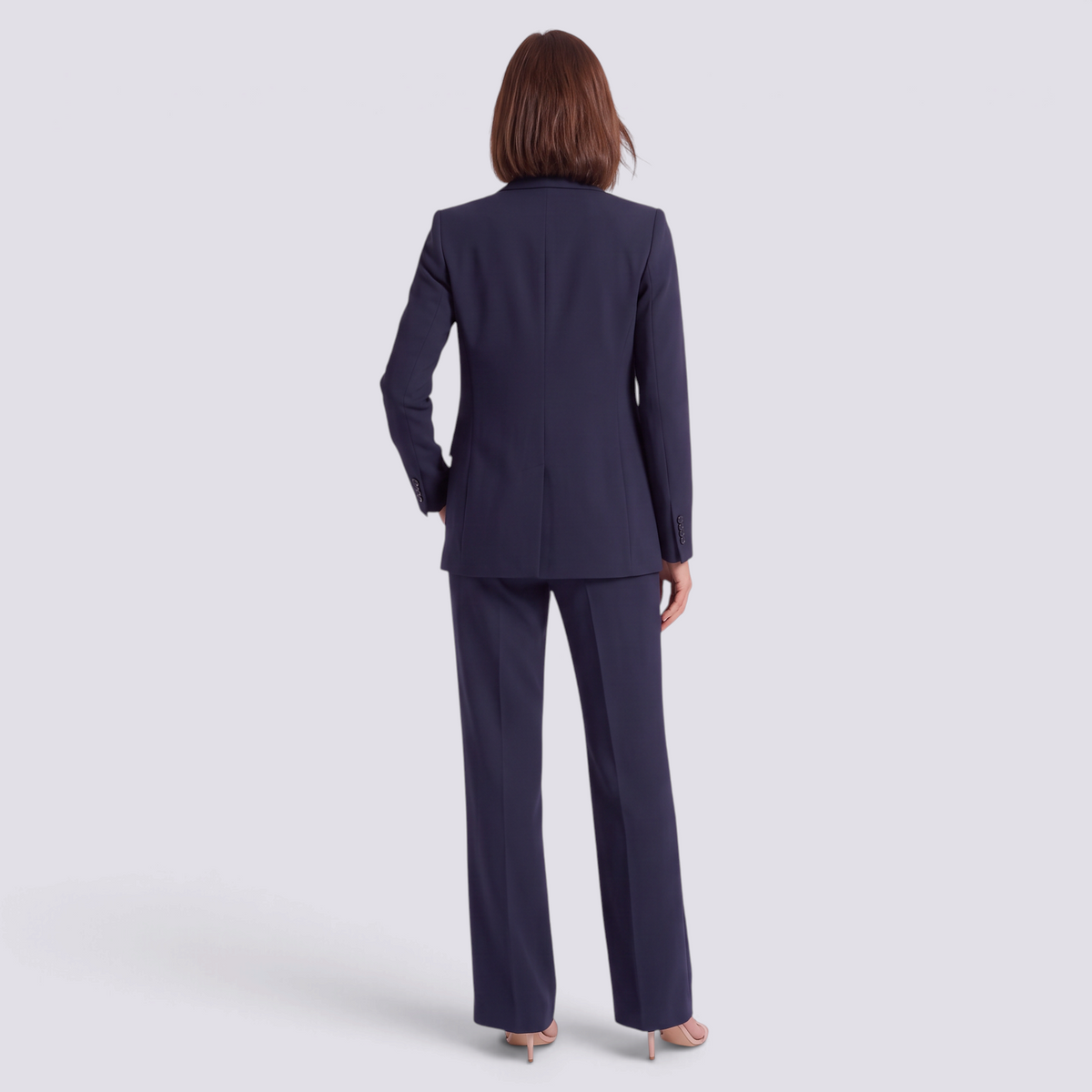 Conjunto traje mujer de tres piezas en azul marino con blazer y pantalón ancho, vista trasera