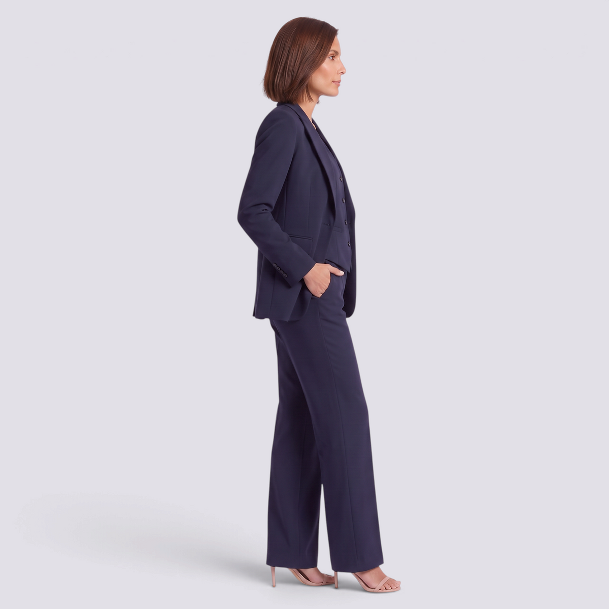 Conjunto traje mujer de tres piezas en azul marino con blazer y pantalón ancho, vista lateral