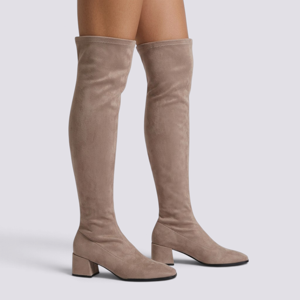 Essyro beige over-the-knee boots with a soft suede-effect finish, elasticated shaft, and comfortable block heel.