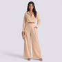 Essyro beige two-piece set featuring a long-sleeve wrap top with lapel collar and high-waisted wide-leg palazzo pants.
