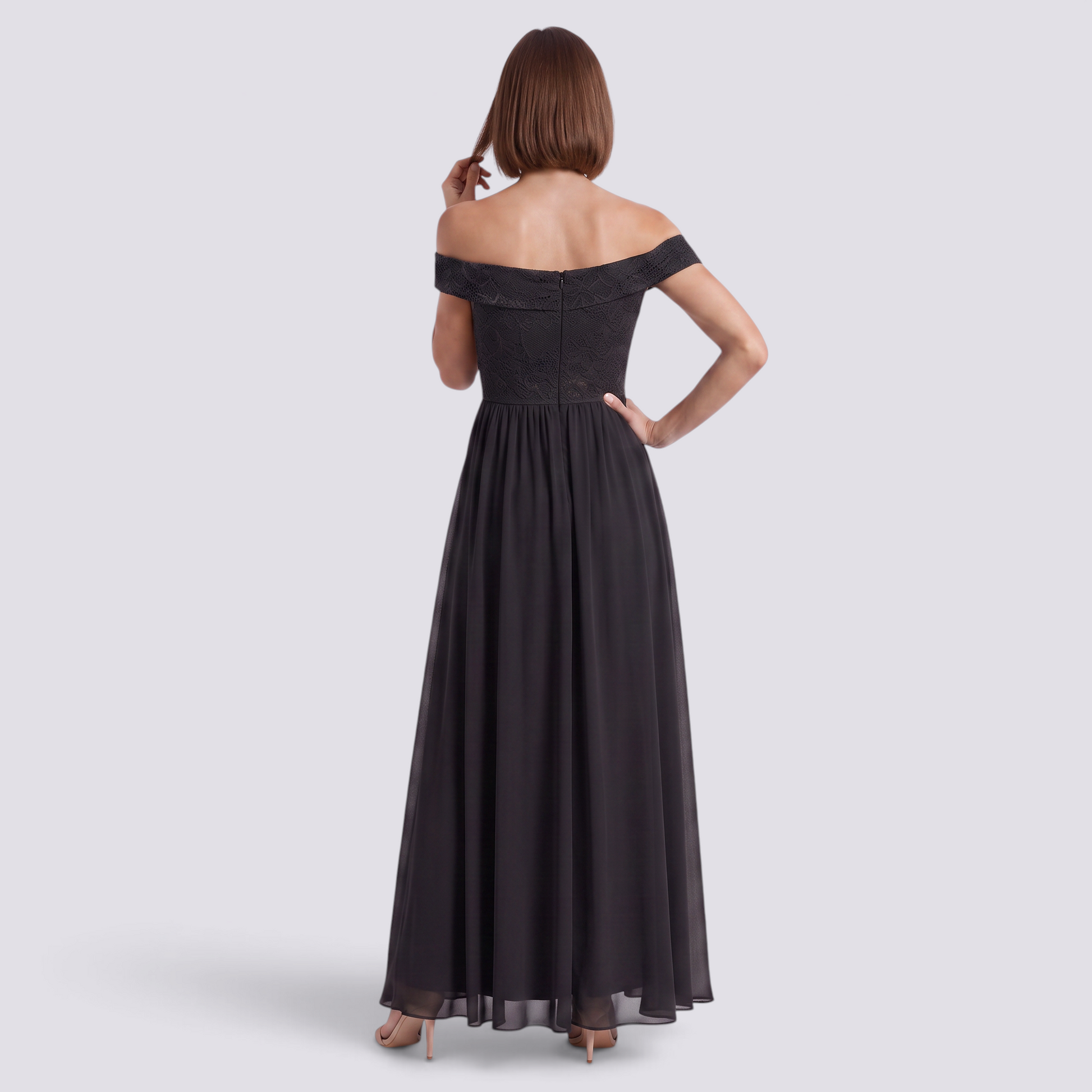 Essyro black floor-length evening gown with a bardot neckline, lace bodice, and a flowing A-line chiffon skirt.