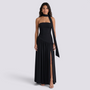 Essyro black floor-length evening gown with a halter neckline, strapless bodice, and an asymmetric draped skirt.