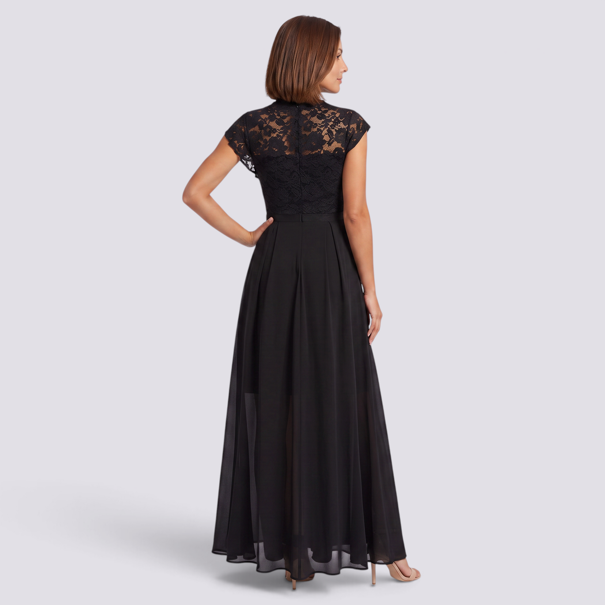 Essyro black lace maxi dress with high waist and A-line skirt worn by a model, back view