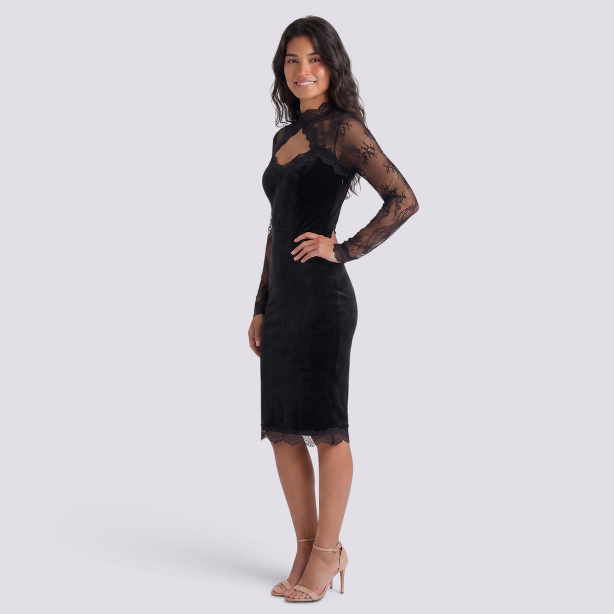 Essyro black midi sheath dress with lace sleeves, high neck, diamond cutout, and scalloped hem on a smiling model