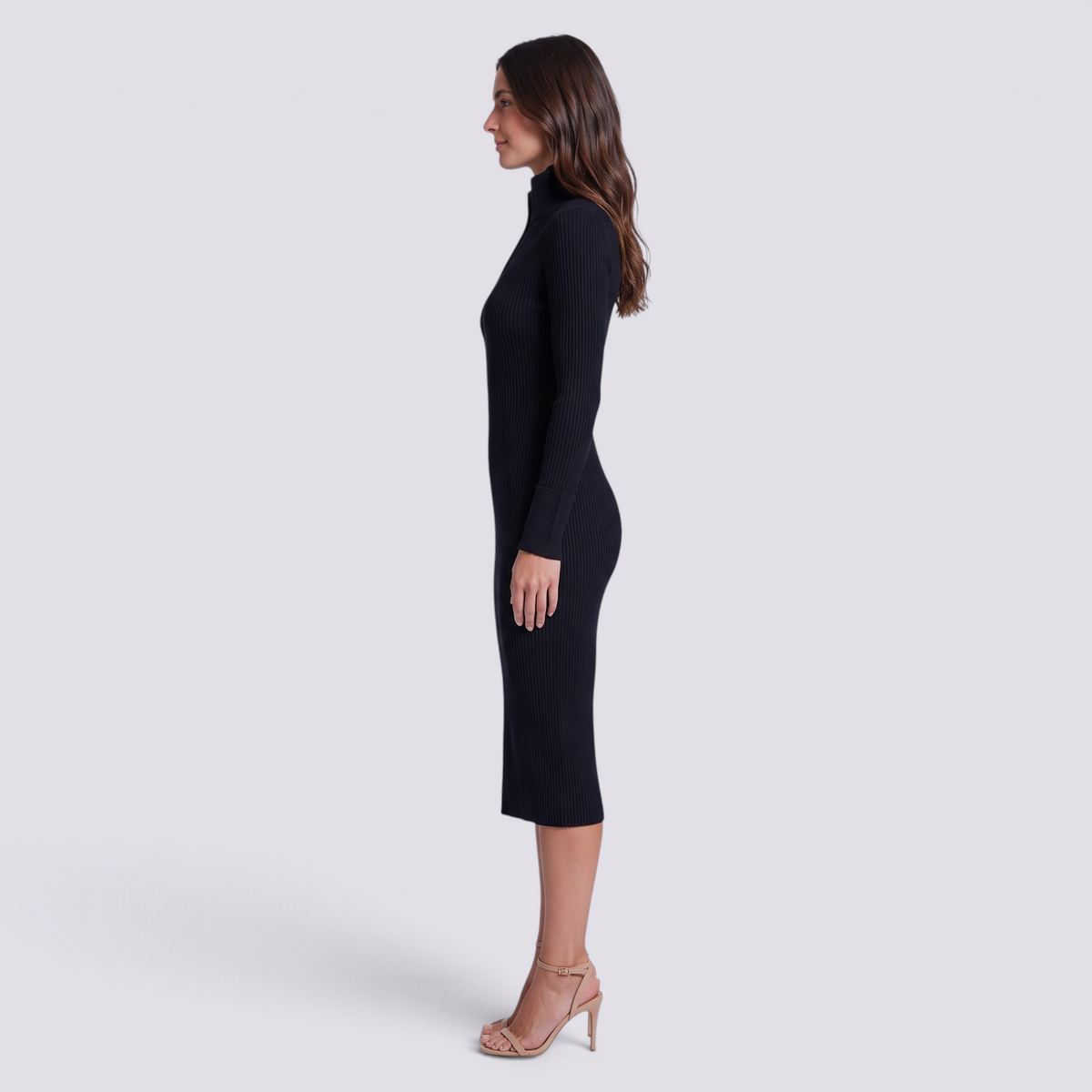 Essyro black ribbed midi dress with high neck and long sleeves worn by a model in profile view.