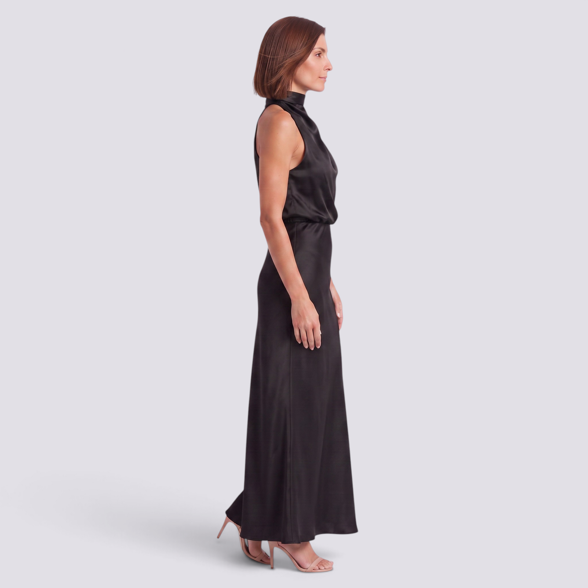 Essyro black satin halter neck maxi dress with draped bodice and flowing bias-cut skirt on a model, side view