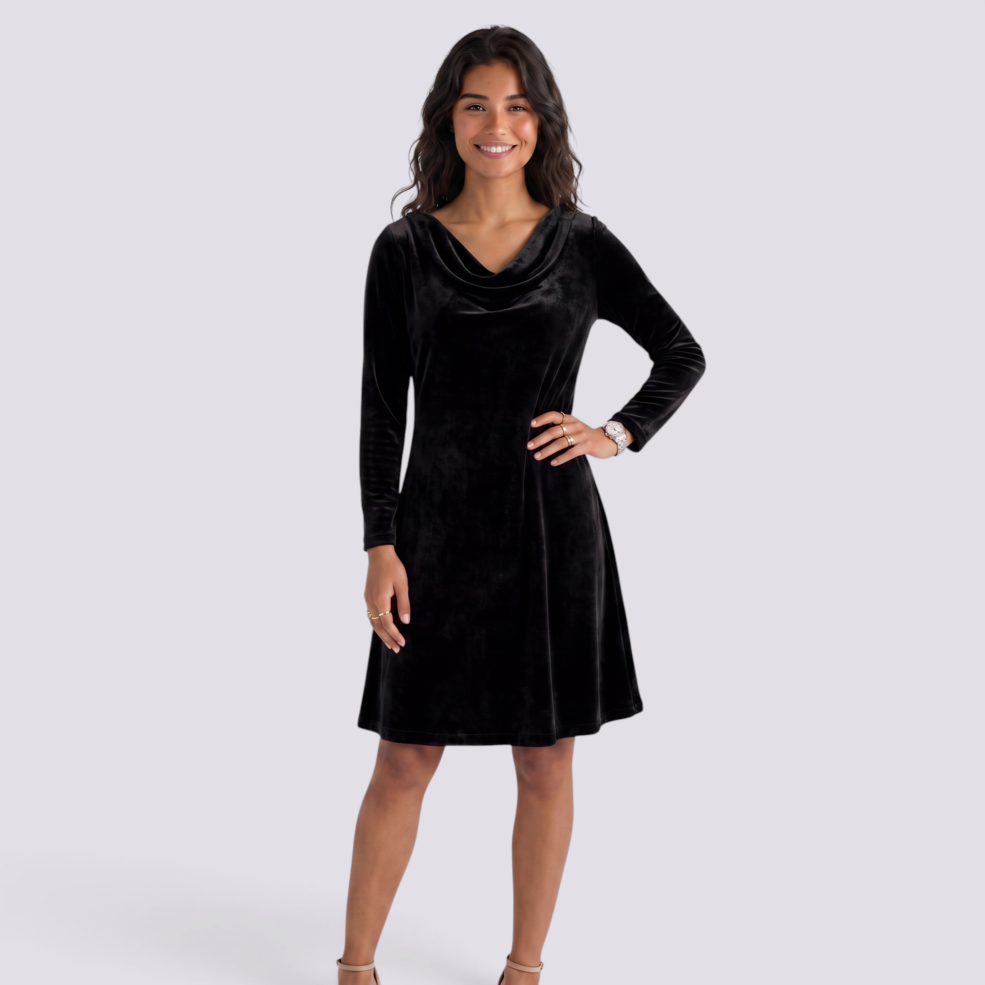 Essyro black velvet short dress with long sleeves and a draped cowl neckline worn by a smiling model