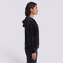 Essyro black velvet hooded cardigan with button closure worn by a woman in a side profile view