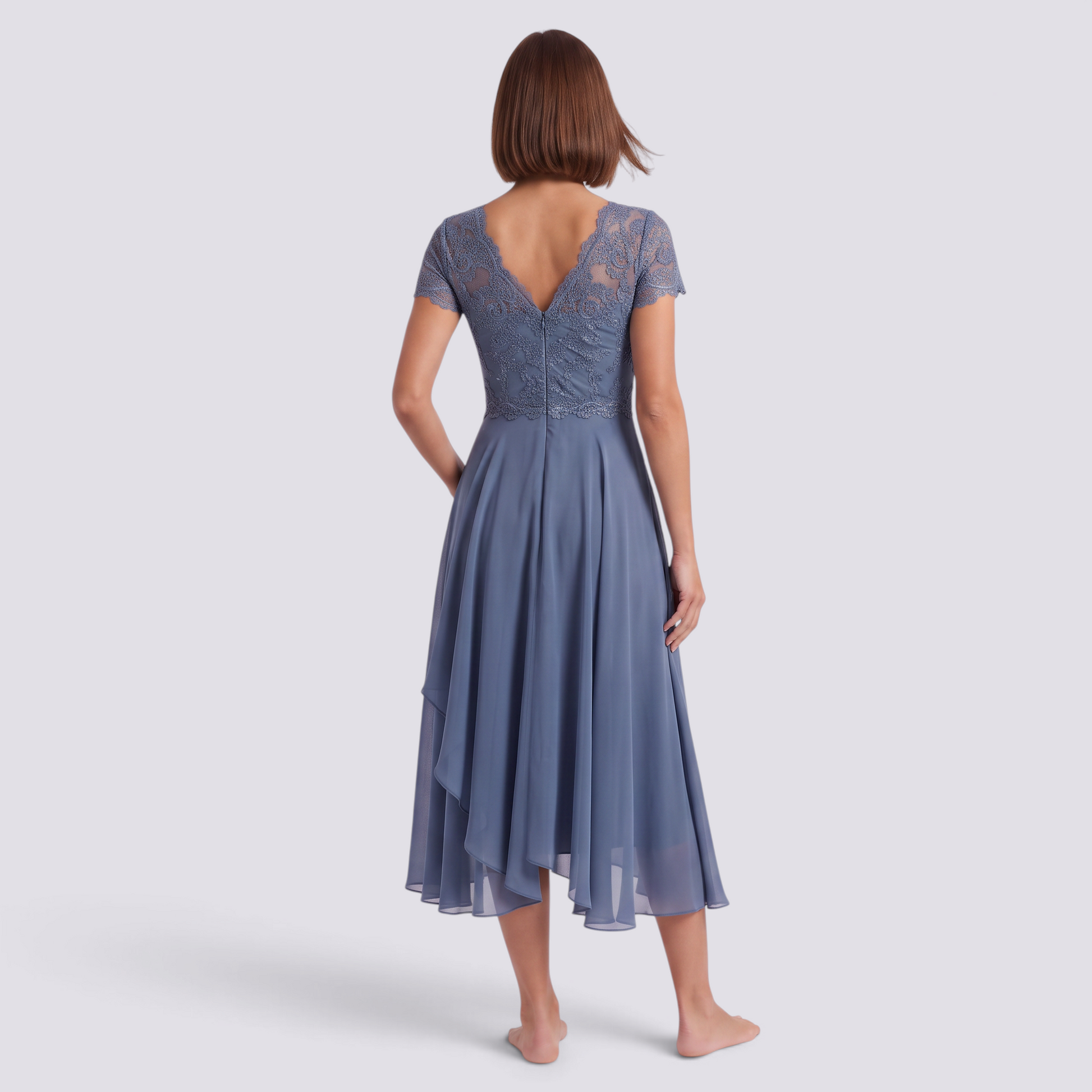 Essyro midi dress in dusty blue with a V-neck back, intricate lace detailing, and a flowing chiffon skirt.