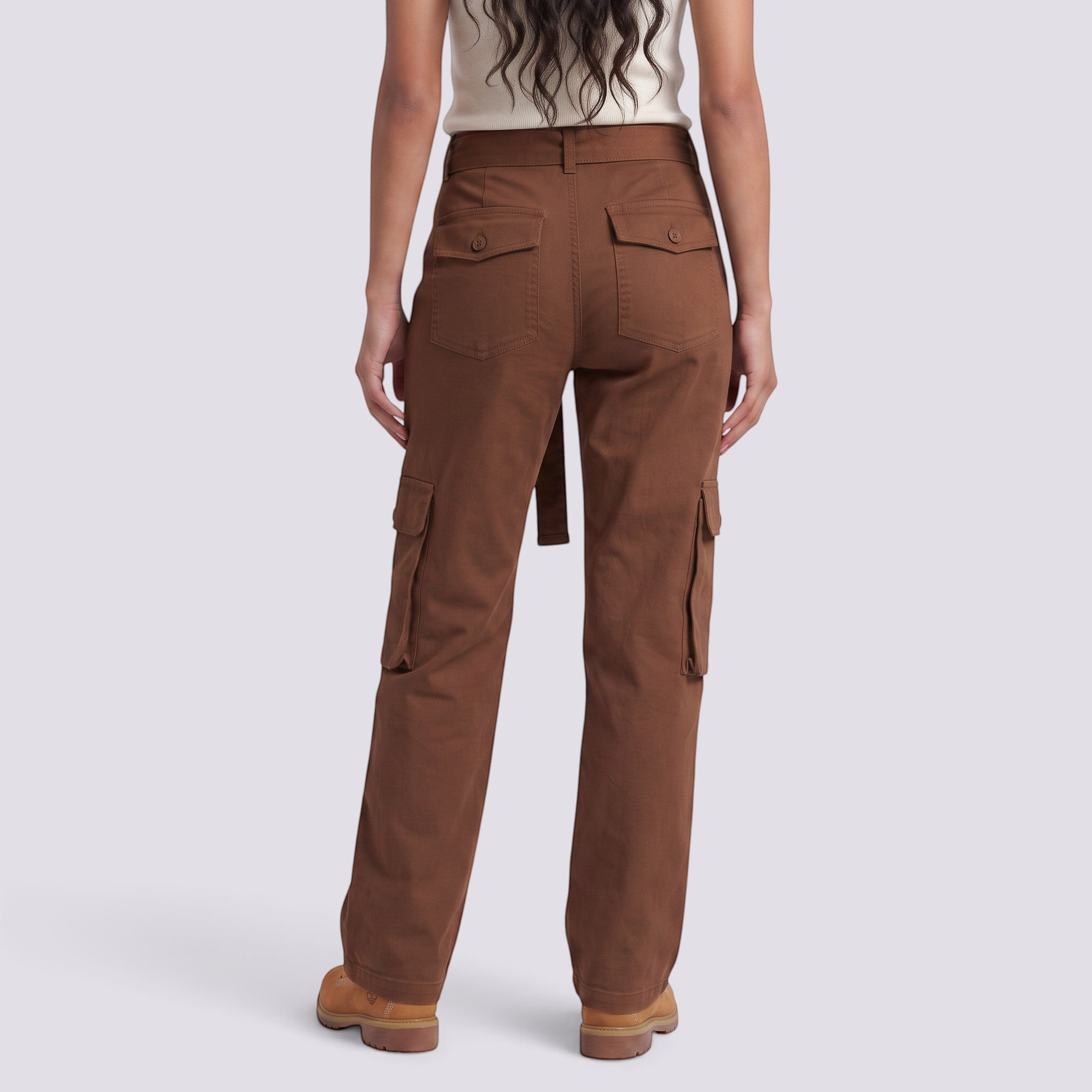 Essyro brown cargo jeans with a washed effect, straight leg, mid-rise, and functional utility pockets, back view.