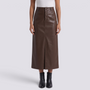Essyro brown faux leather midi skirt with high waist, front slit, and button closure worn by a model