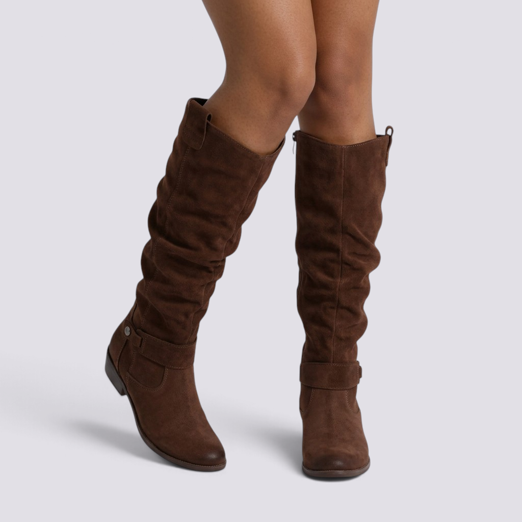 Essyro brown knee-high boots with a slouchy suede-effect finish, low block heel, and decorative ankle strap.