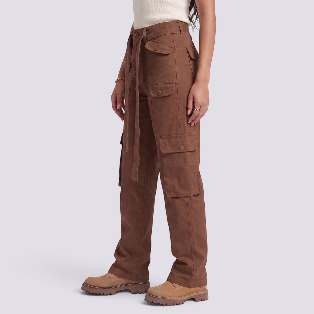 Essyro brown cargo jeans for women with a washed effect, straight leg fit, and functional utility pockets.