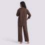 Essyro brown two-piece set featuring a long-sleeve button-back shirt and wide-leg trousers on a model, back view.