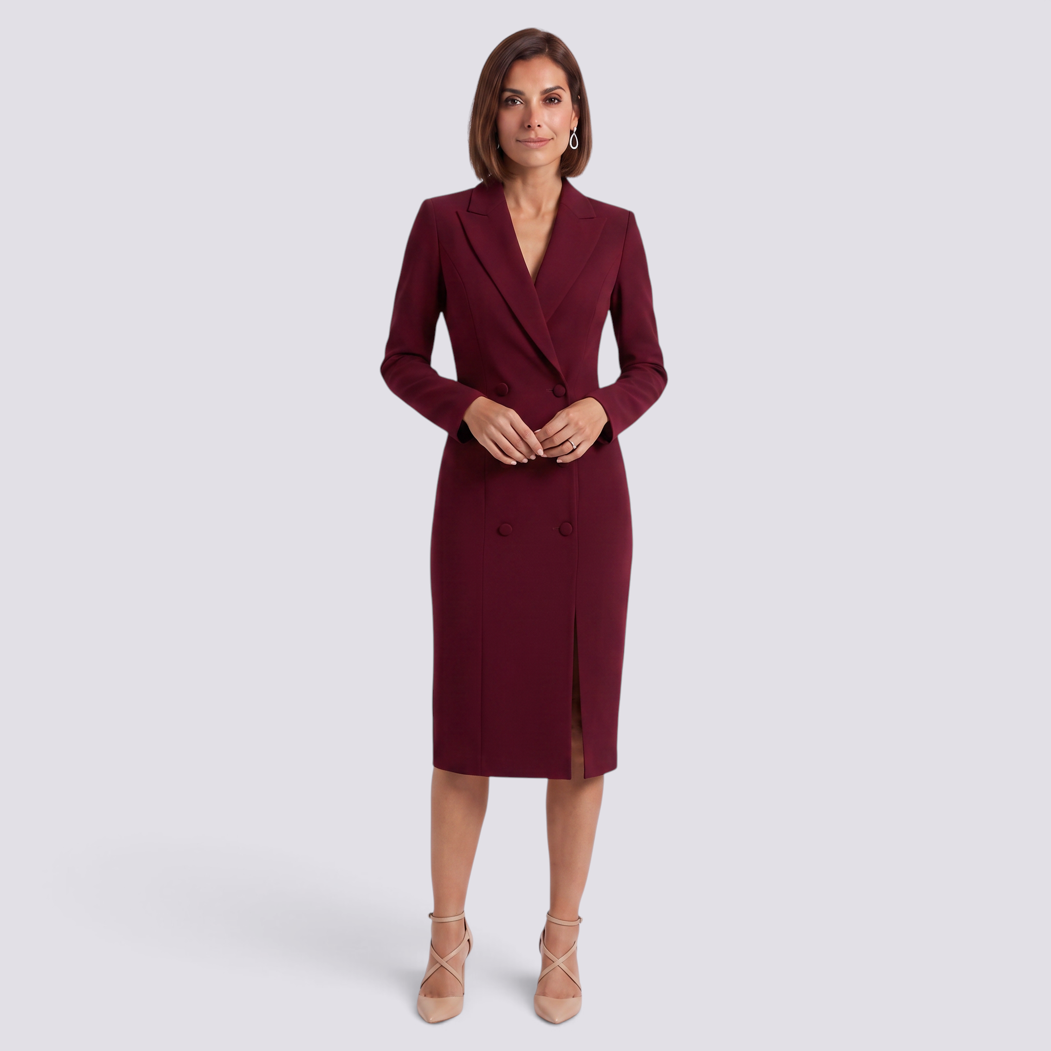 Essyro burgundy double-breasted blazer dress with structured lapels and fitted silhouette worn by a woman