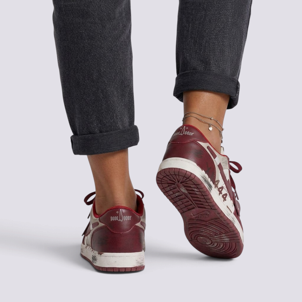 Essyro women's vintage-style skate sneakers in burgundy with distressed finish, rubber sole, and lace-up closure.