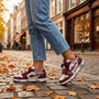 Essyro women's vintage-style skate sneakers in burgundy and white with distressed finish and heart charm on laces
