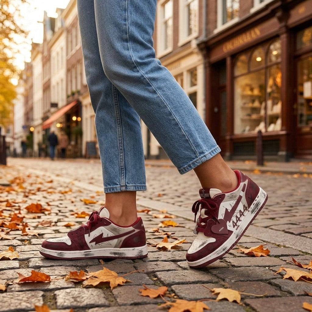 Essyro women's vintage-style skate sneakers in burgundy and white with distressed finish and heart charm on laces