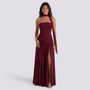 Essyro burgundy floor-length party dress with halter neck, draped asymmetric skirt, and high side slit on a model.