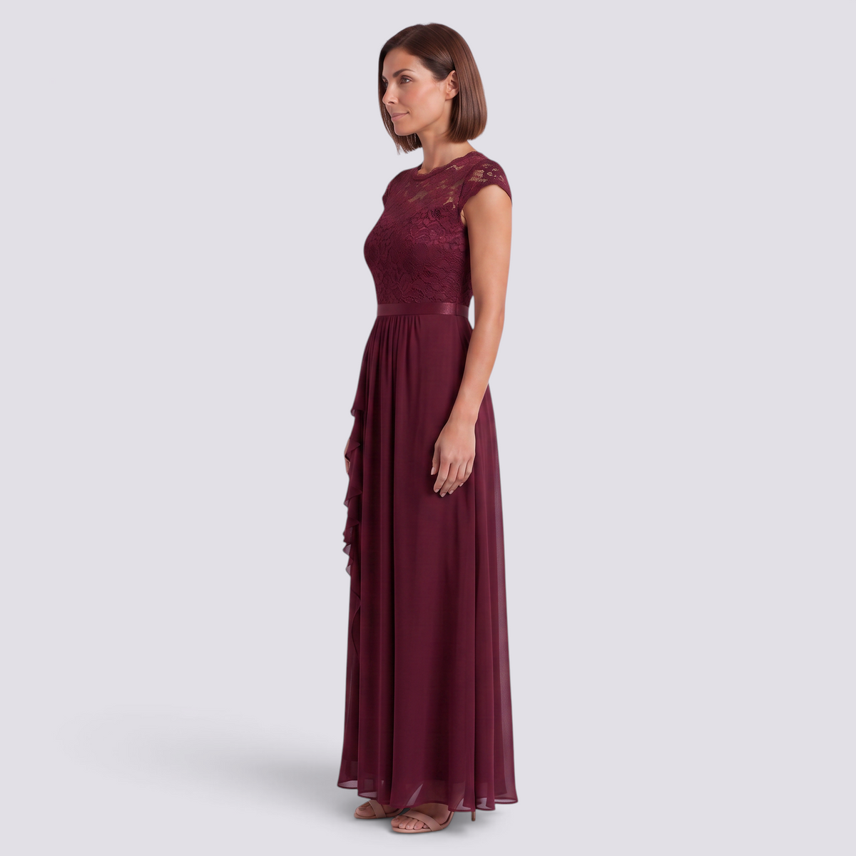 Essyro burgundy lace maxi dress with a high waist and A-line skirt worn by a woman in a side profile view