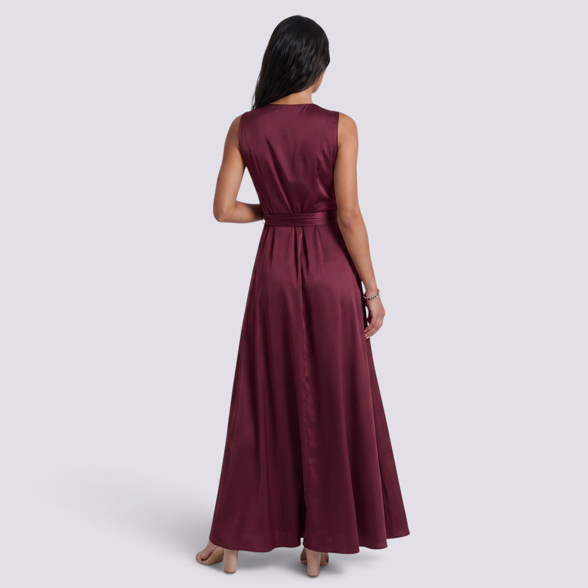 Essyro sleeveless burgundy maxi dress with a belted waist and fluid skirt, shown from the back on a model.
