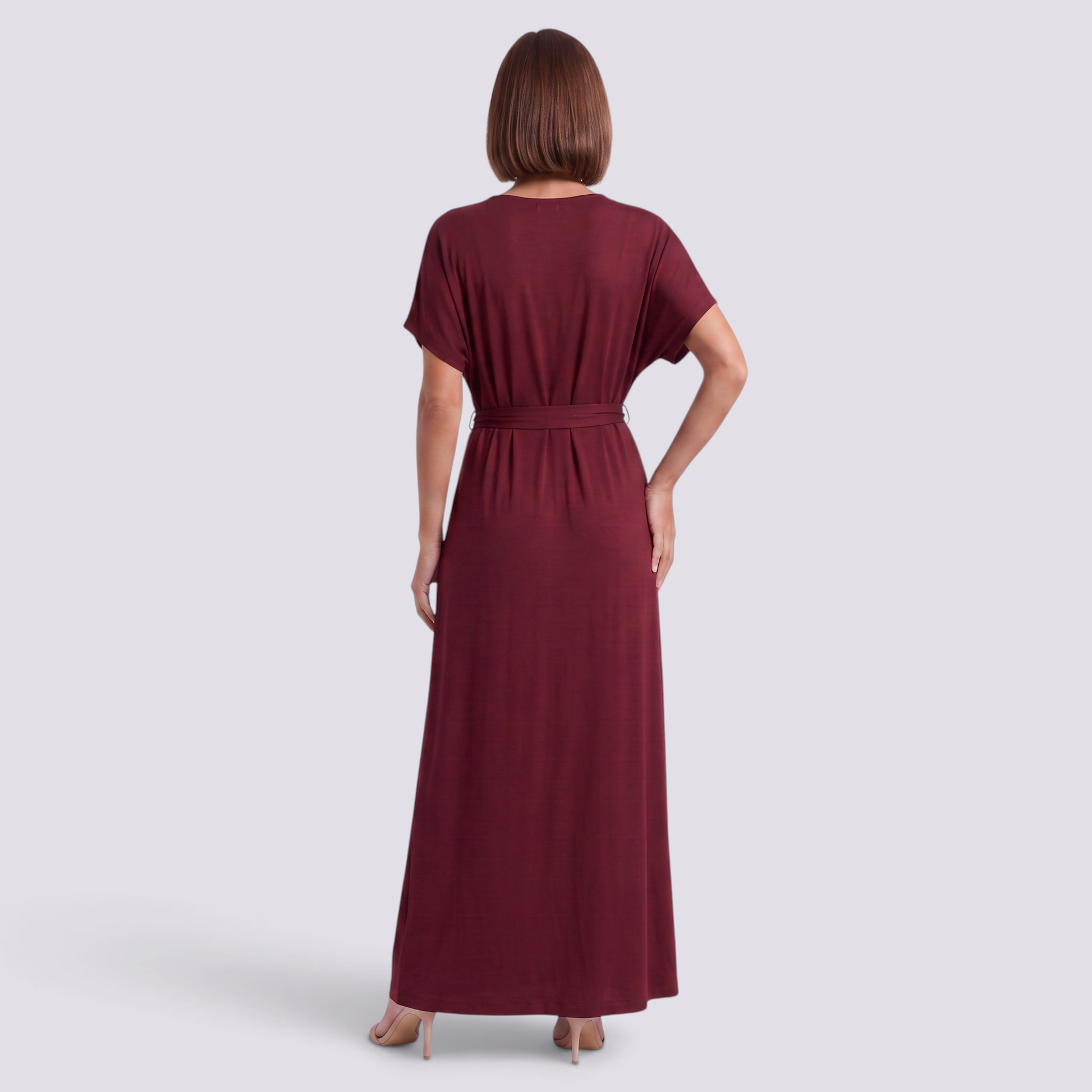 Essyro plus size burgundy maxi dress with short sleeves and a belted waist, shown from the back on a model.