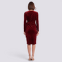 Essyro back view of a burgundy velvet cocktail dress with long sleeves and a fitted silhouette on a model