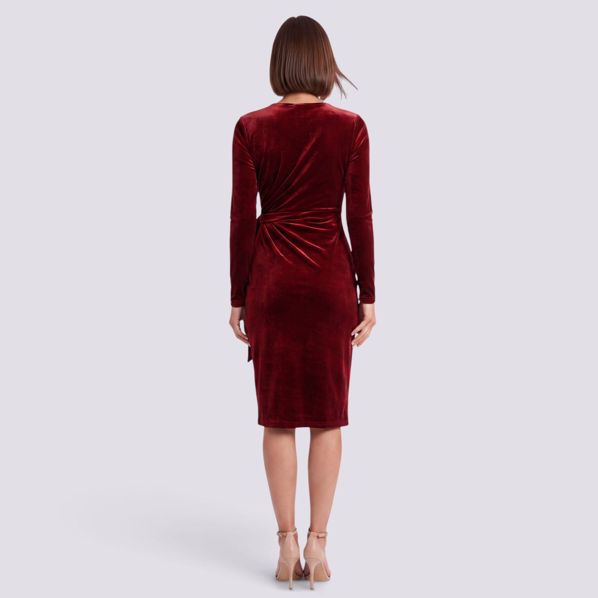 Essyro back view of a burgundy velvet cocktail dress with long sleeves and a fitted silhouette on a model