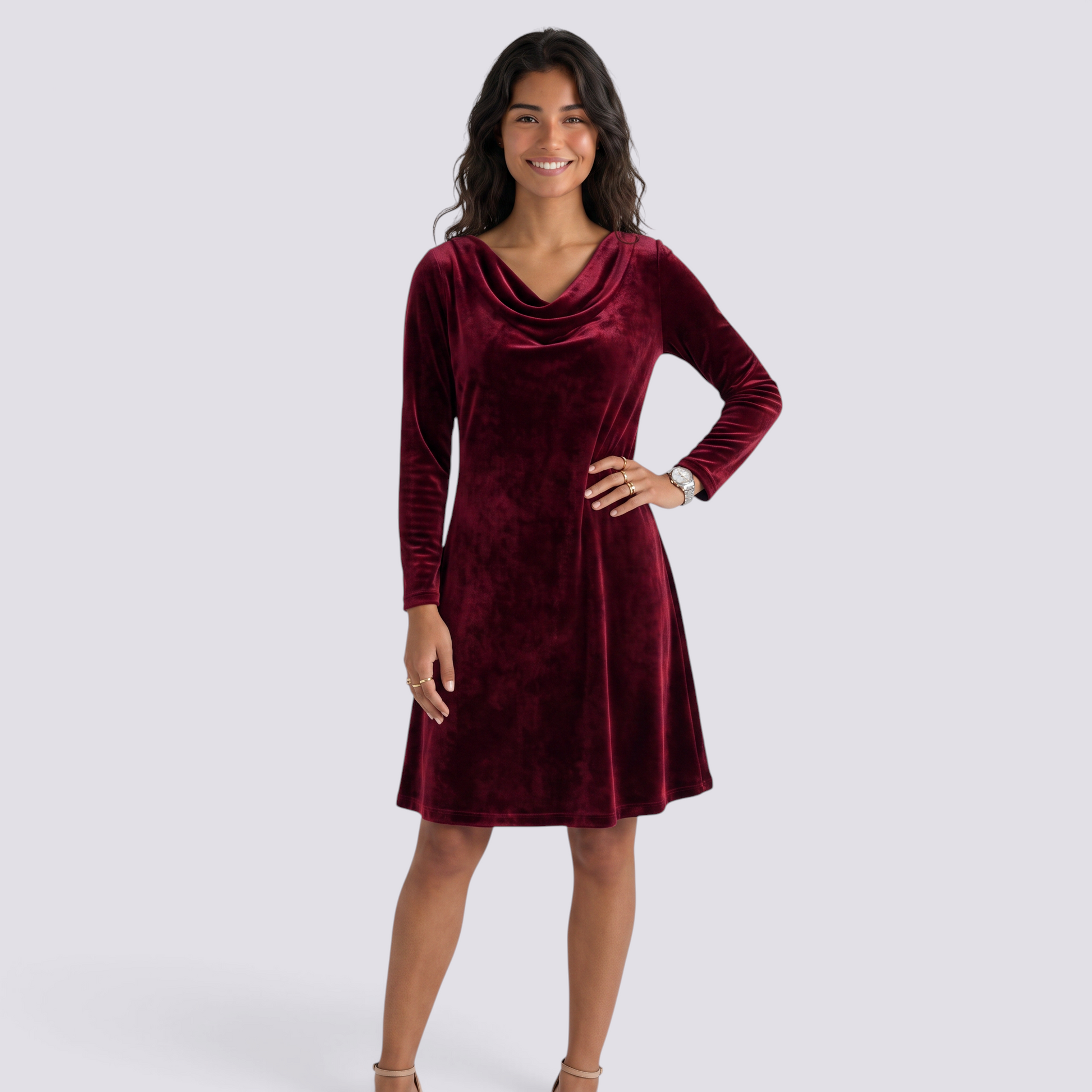 Essyro burgundy velvet short dress with long sleeves and a draped cowl neckline worn by a smiling model.