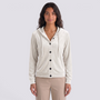 Essyro velvet hooded cardigan in cream with front button closure worn by a woman against a neutral background