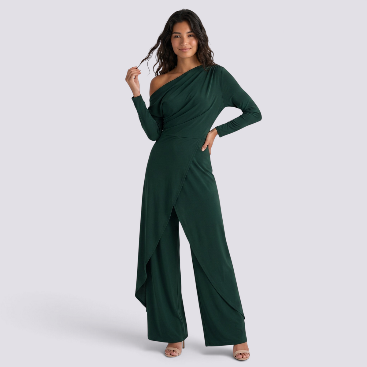 Essyro dark green one-shoulder jumpsuit with long draped sleeve and wide-leg wrap trousers on a model