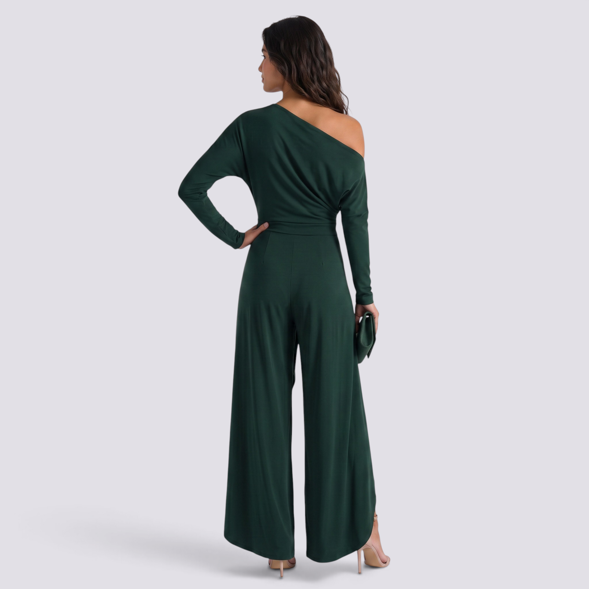 Essyro dark green one-shoulder jumpsuit with long draped sleeve and wide-leg trousers, back view on a model
