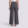 Essyro dark grey high-waisted wide-leg tailored trousers with a fluid drape, viewed from the back.