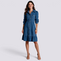 Essyro long-sleeve denim shirt dress with a button-down front, cinched waist, and ruffled hem on a smiling model