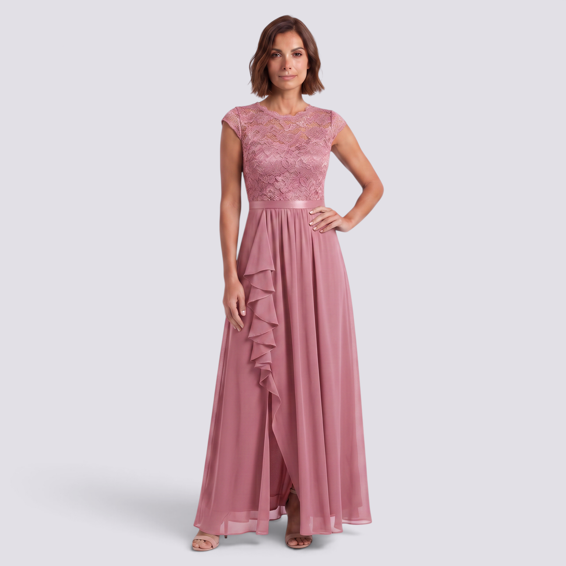 Essyro dusty pink A-line maxi dress with delicate lace bodice, high waist, and ruffled skirt detail on a model