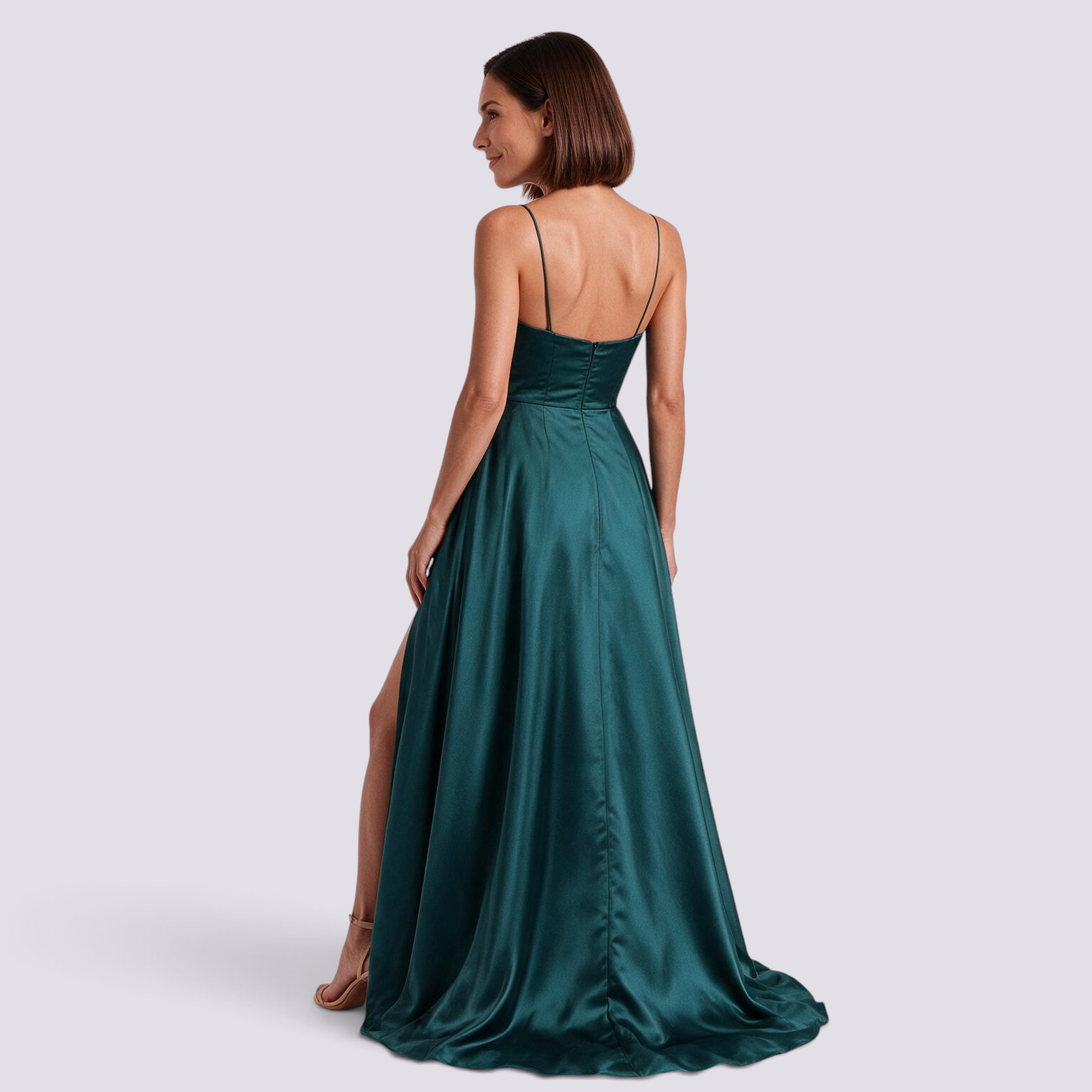 Essyro emerald green floor-length satin evening gown with a high leg slit and spaghetti straps, back view