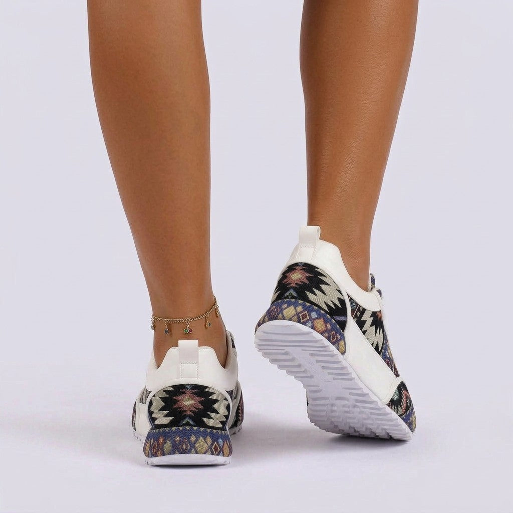 Essyro chunky dad shoes featuring a woven ethnic pattern, white trim, and a cushioned sole, shown from behind.