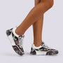 Essyro chunky dad sneakers featuring a vibrant woven ethnic pattern, white trim, and comfortable lace-up design.