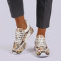 Essyro unisex chunky dad shoes featuring a woven ethnic pattern in beige, blue, and red with white laces.