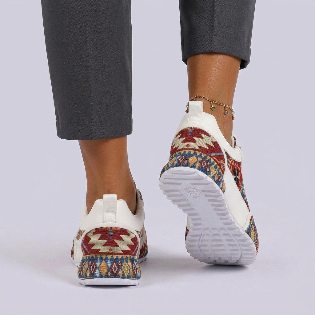 Essyro unisex chunky dad shoes featuring a woven ethnic pattern in red, blue, and yellow on a white base